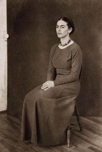 Frida Kahlo (seated)