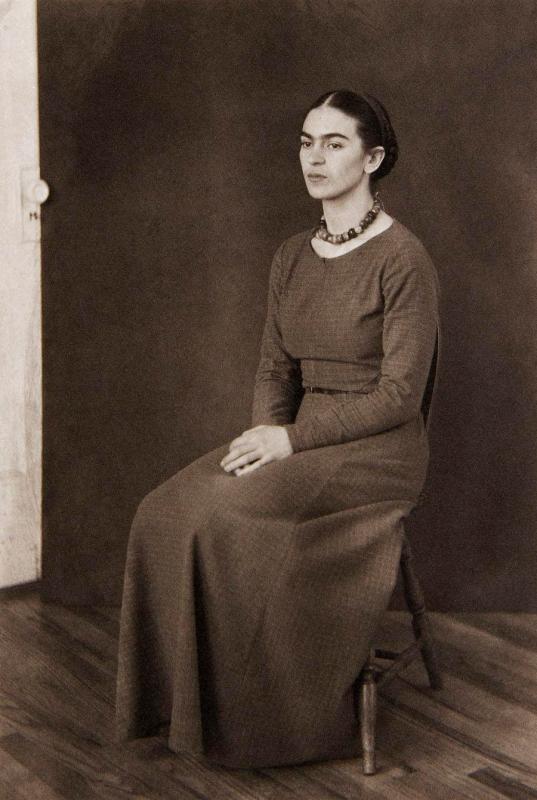 Frida Kahlo (seated)